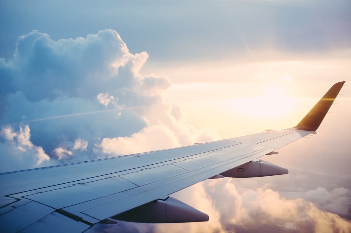 Aircraft and runway at dusk, symbolising airport transfers